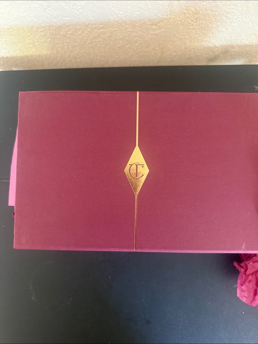 Charlotte Tilbury Burgundy Box with Gold Logo